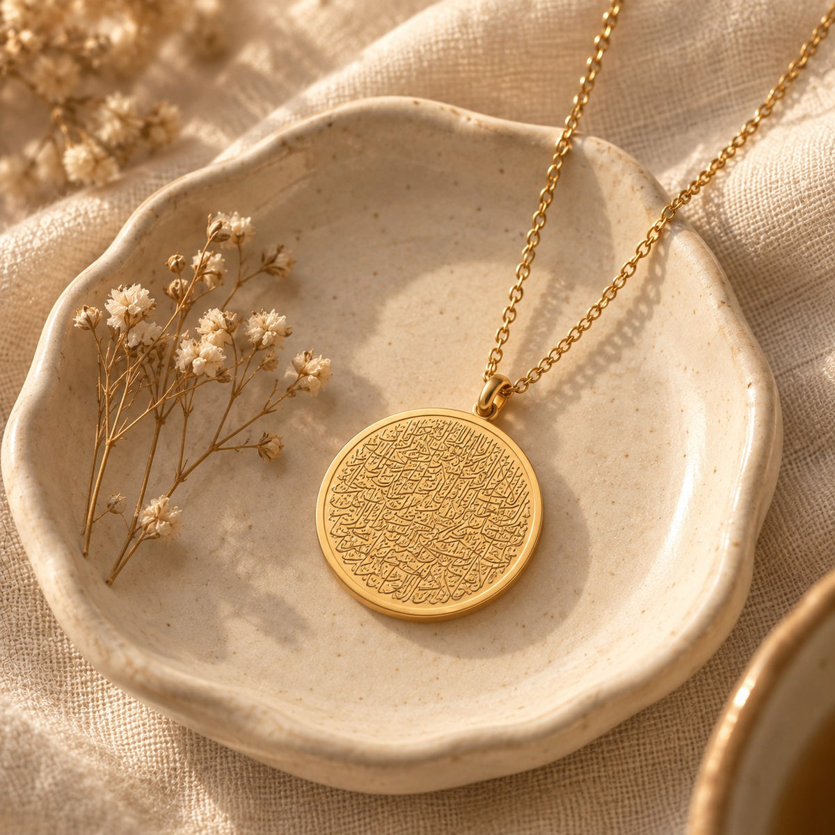 The Ayatul Kursi Necklace | Women in a ceramic trinket dish