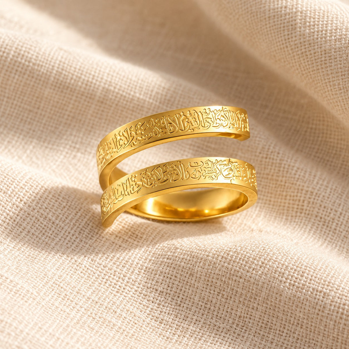 Ayatul Kursi Spiral Ring on cream linen