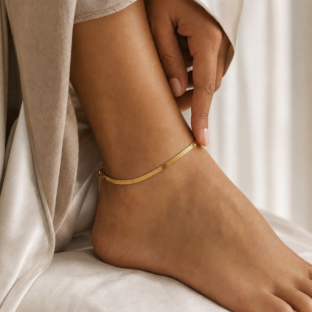 Woman wearing the Herringbone Anklet