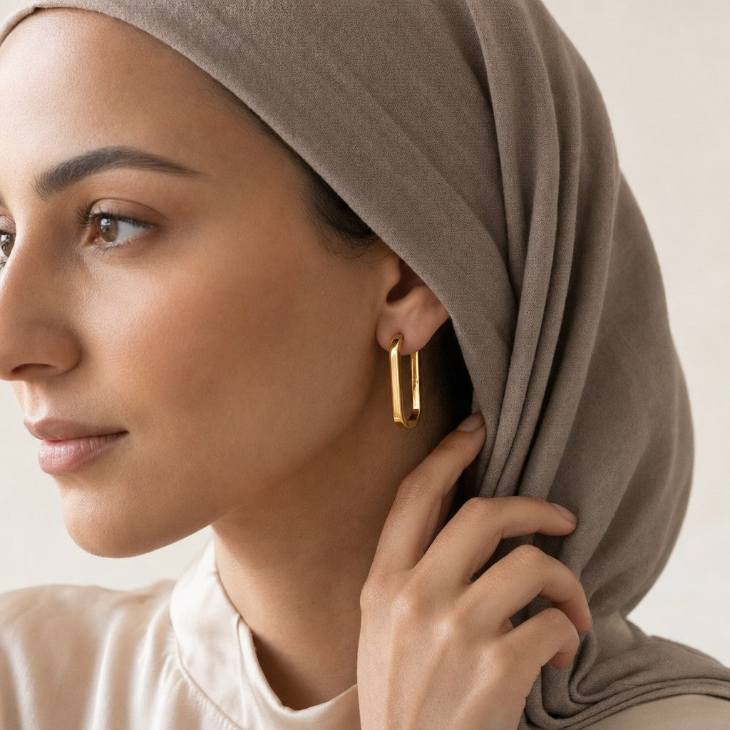 Woman wearing the Minimal Square Hoops