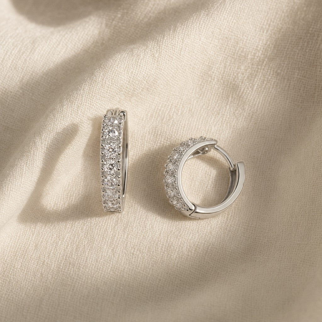 Layal Moissanite Hoops on cream linen