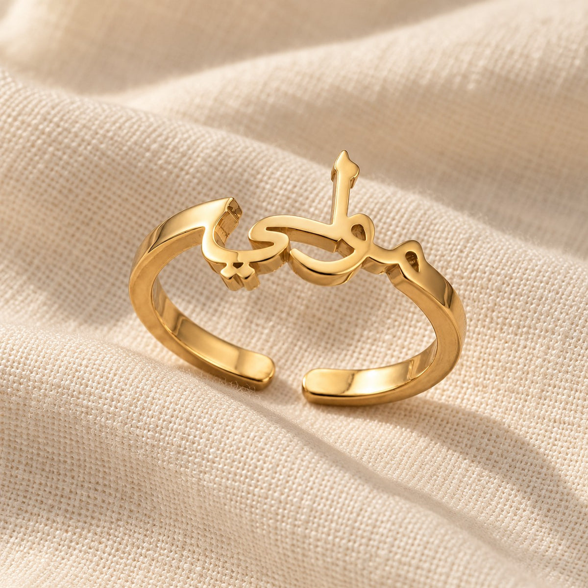 Arabic Custom Name Ring on cream linen