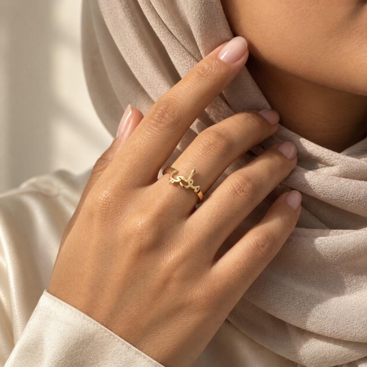 Woman wearing the Arabic Custom Name Ring