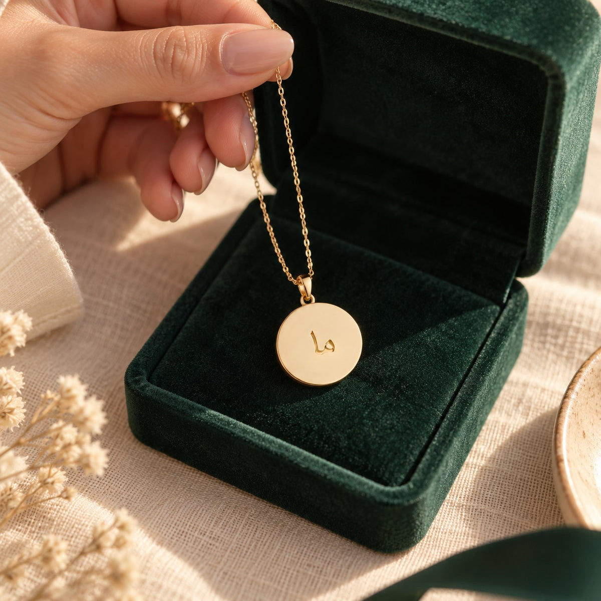 Arabic Initial Pendant Necklace 18k presented in an emerald velvet gift box
