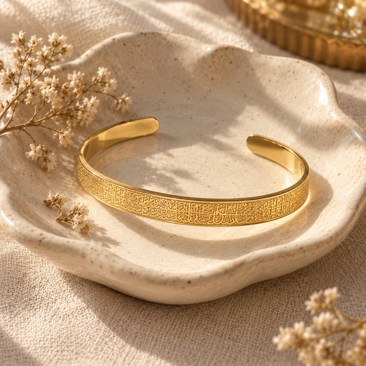 The Ayatul Kursi Cuff | Women in a ceramic trinket dish