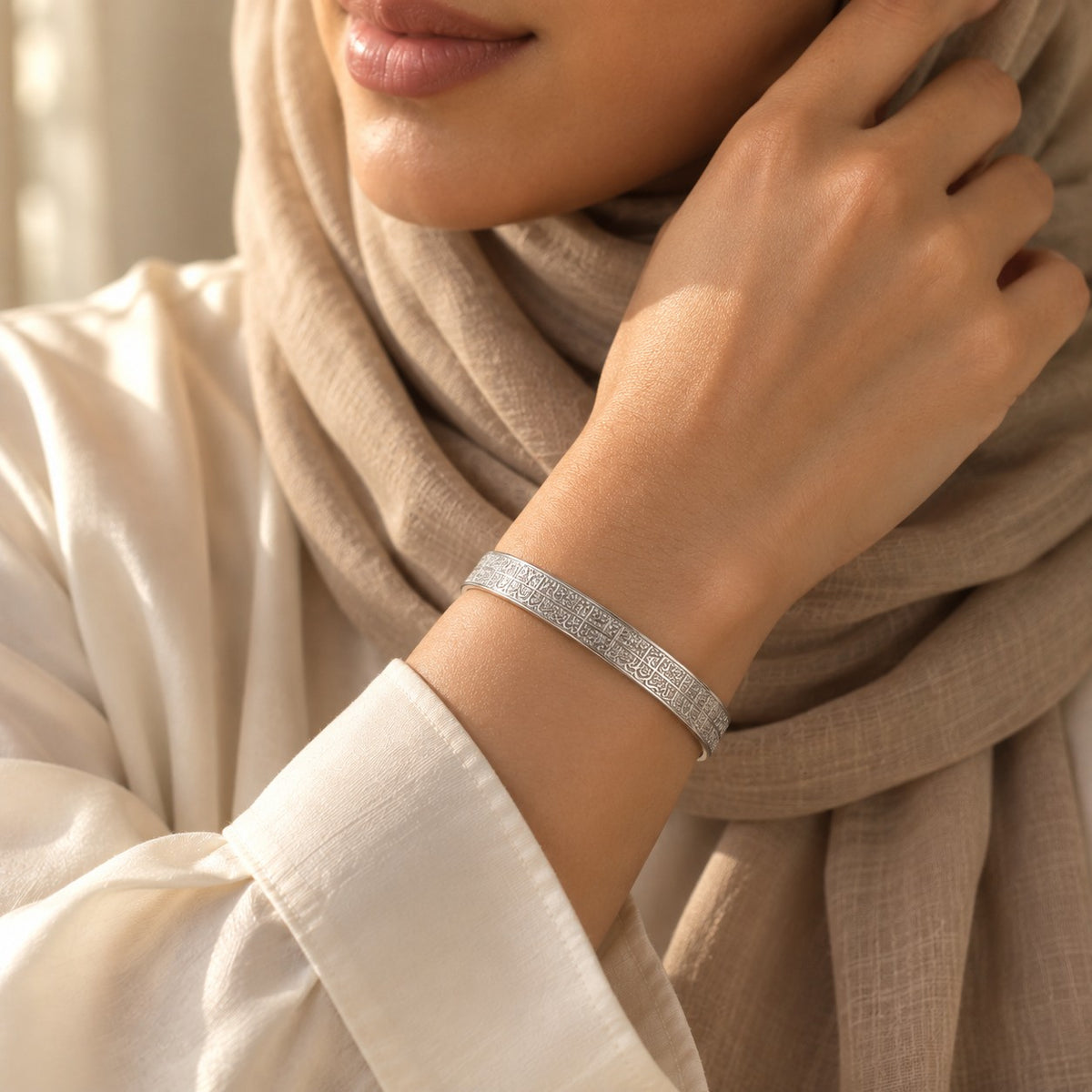 Woman wearing the Ayatul Kursi Cuff | Women in silver