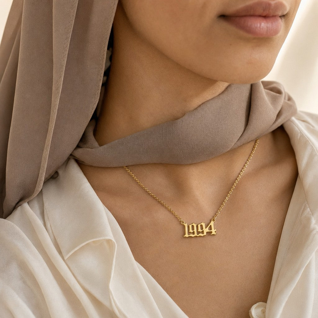 Woman wearing the Custom Birth Year Necklace