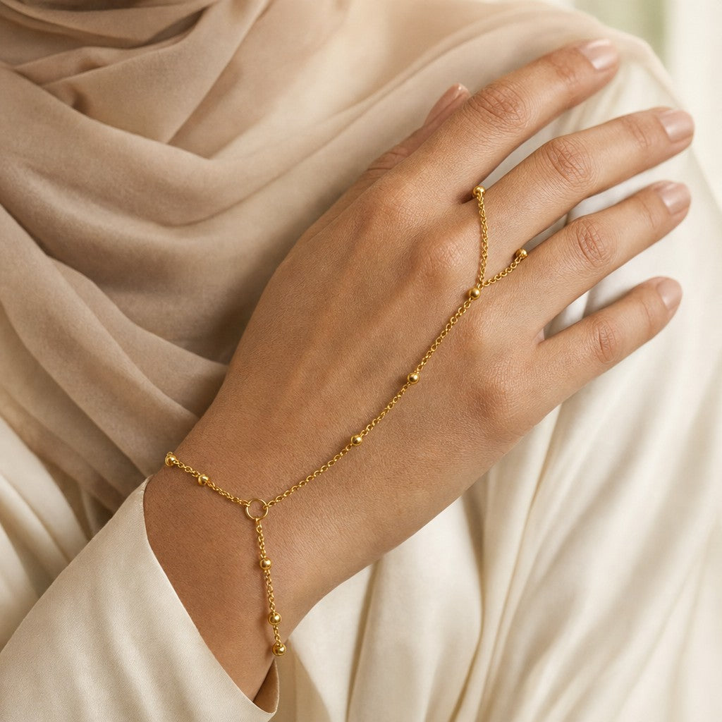 Woman wearing the Dotted Hand Chain