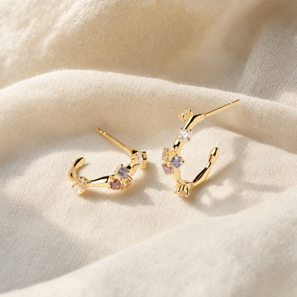 Najmat Climbers Earrings on cream linen