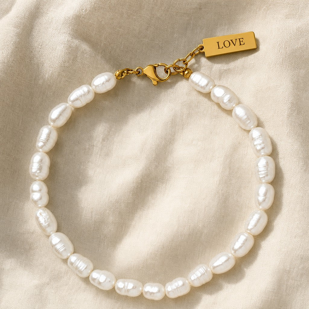 Love Pearl Bracelet on cream linen