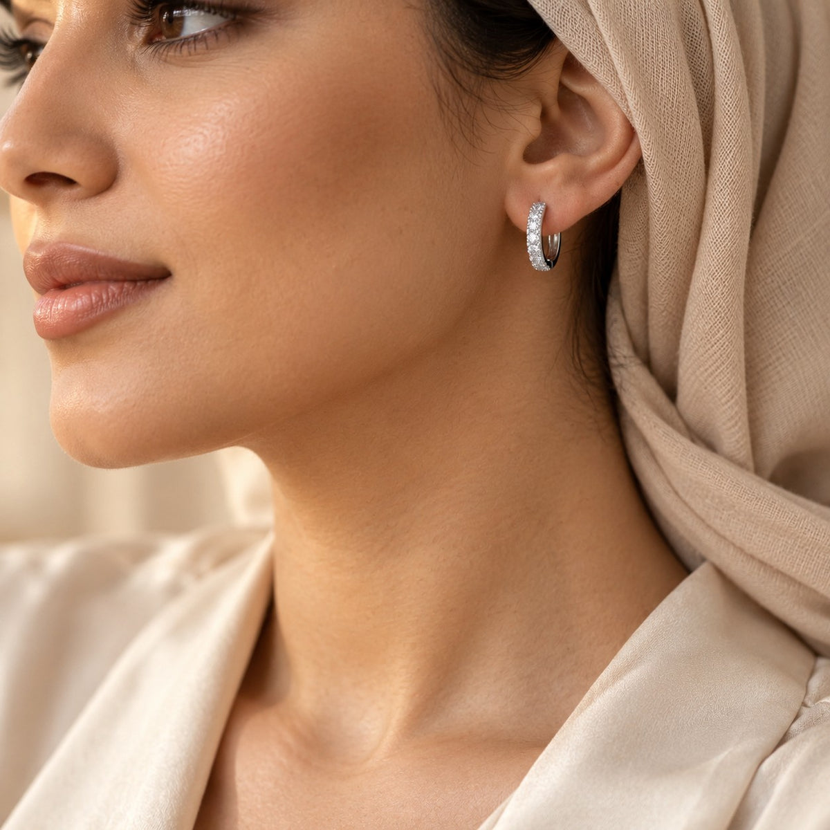 Woman wearing the Layal Moissanite Hoops