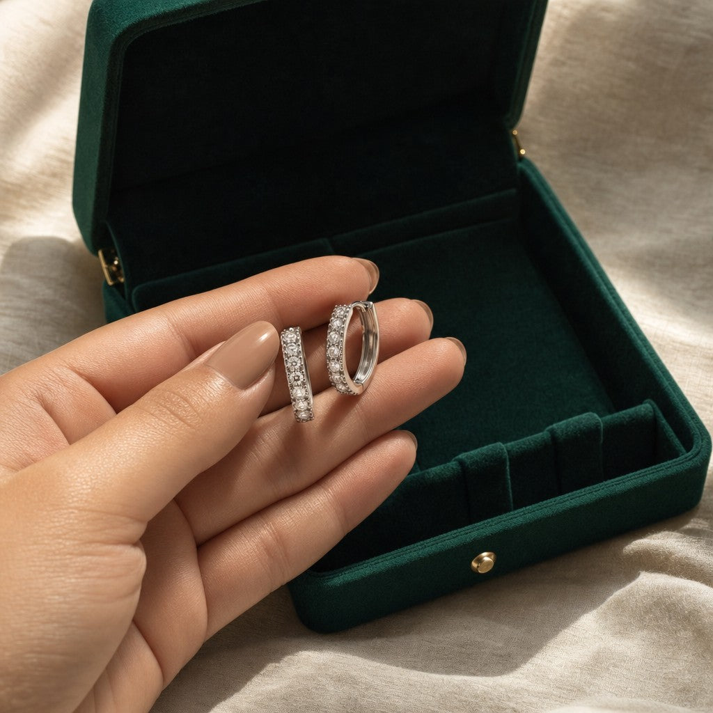 Layal Moissanite Hoops presented in an emerald velvet gift box