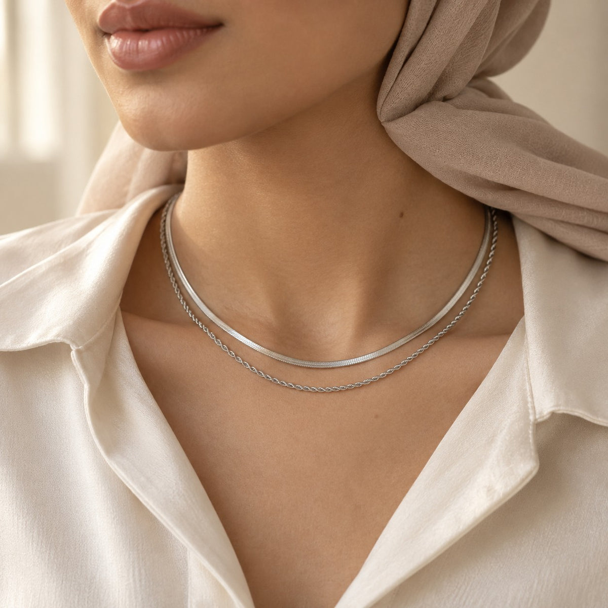 Woman wearing the Luna Chain in silver