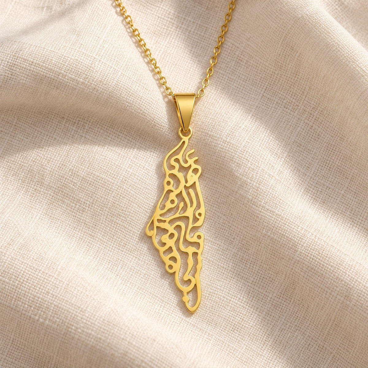 Palestine Calligraphy Map Necklace on cream linen