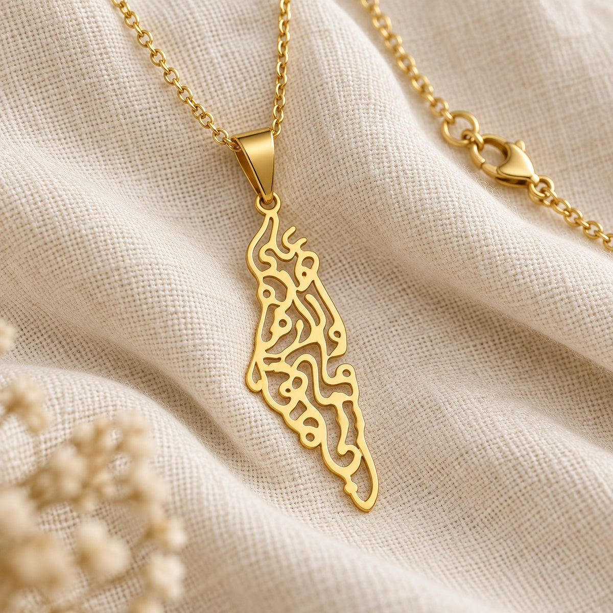 Close-up detail of the Palestine Calligraphy Map Necklace
