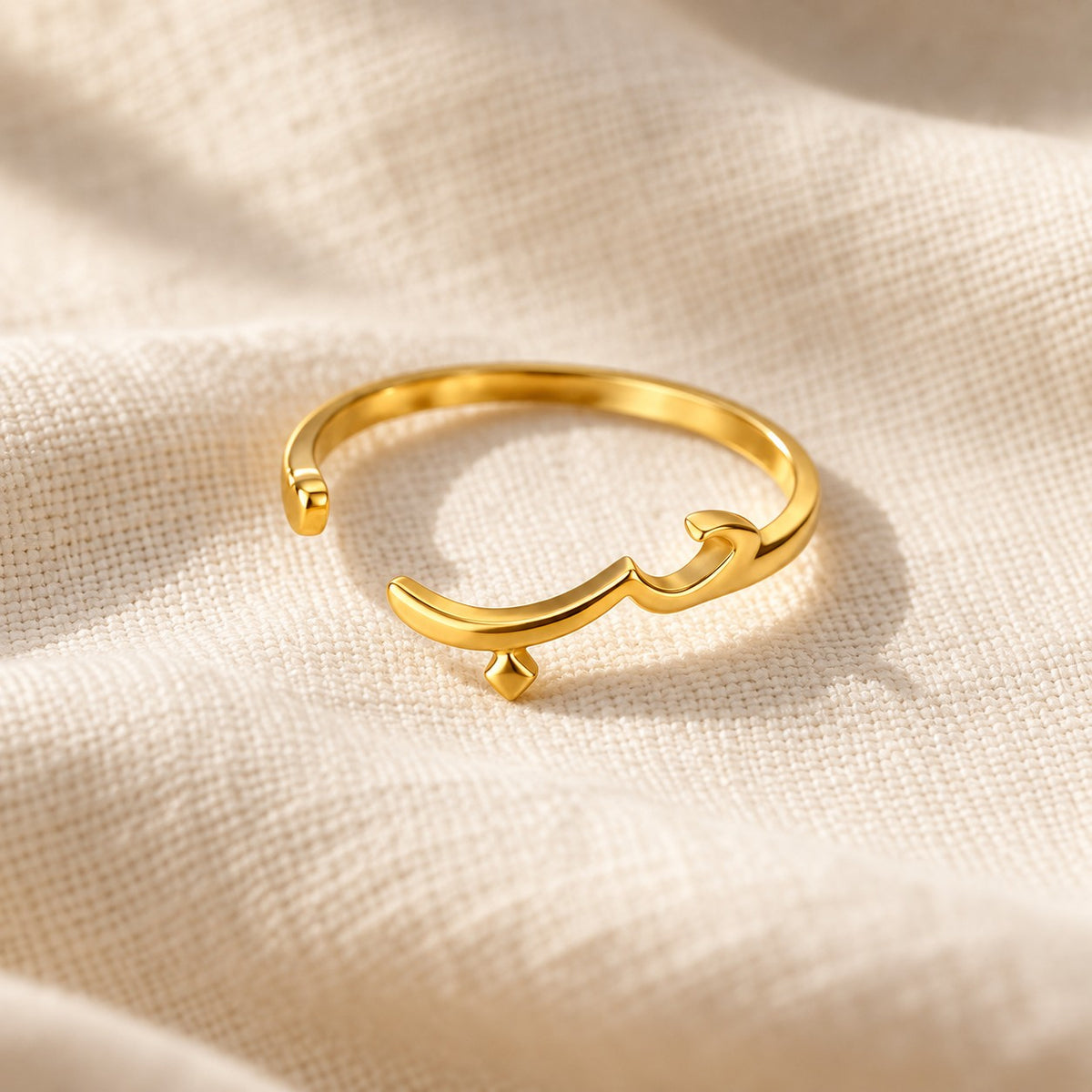 Arabic Love Ring on cream linen
