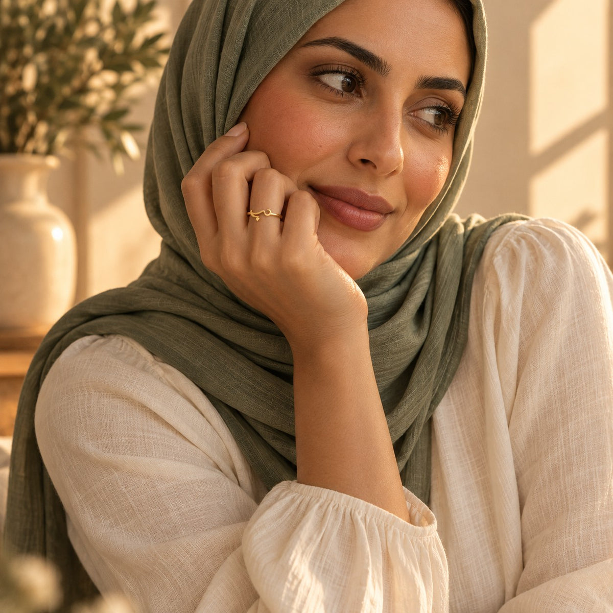 Editorial photo of the Arabic Love Ring being worn