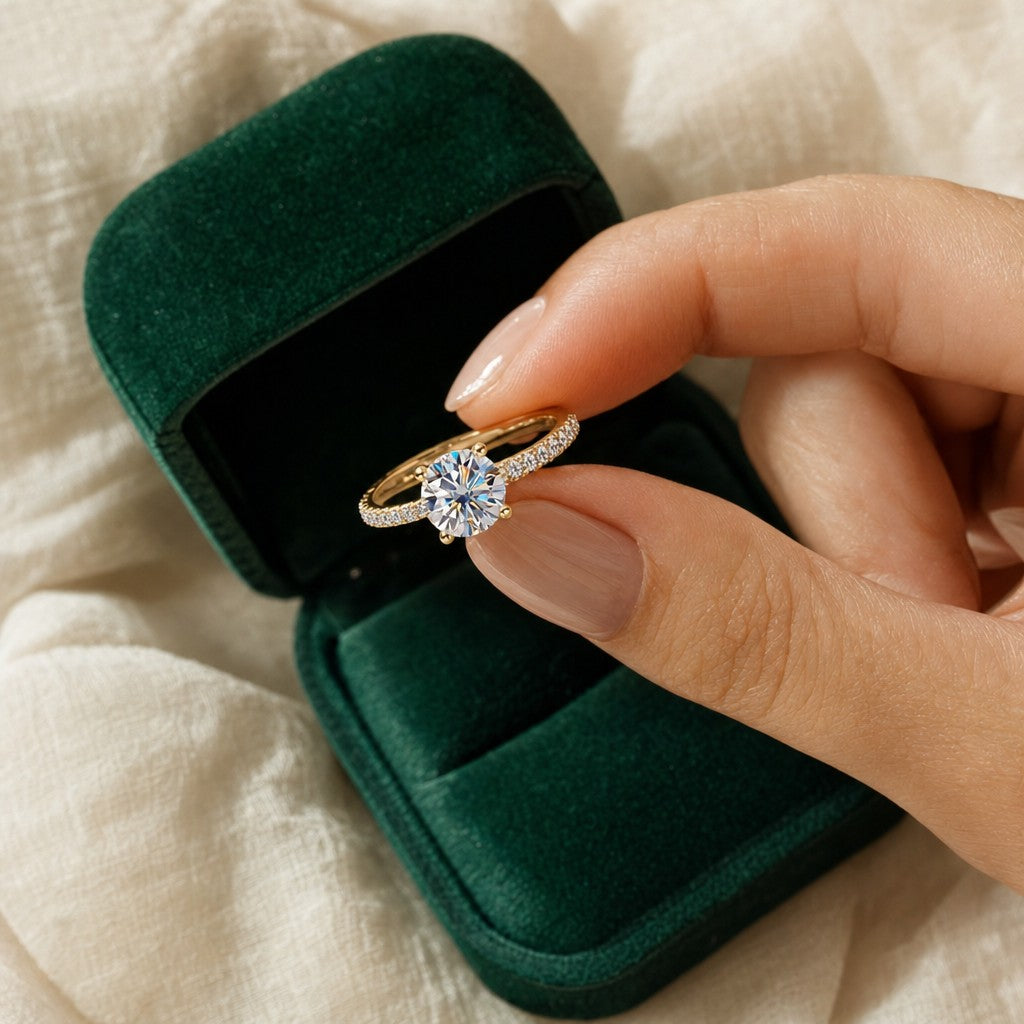 Solitaire Ring presented in an emerald velvet gift box