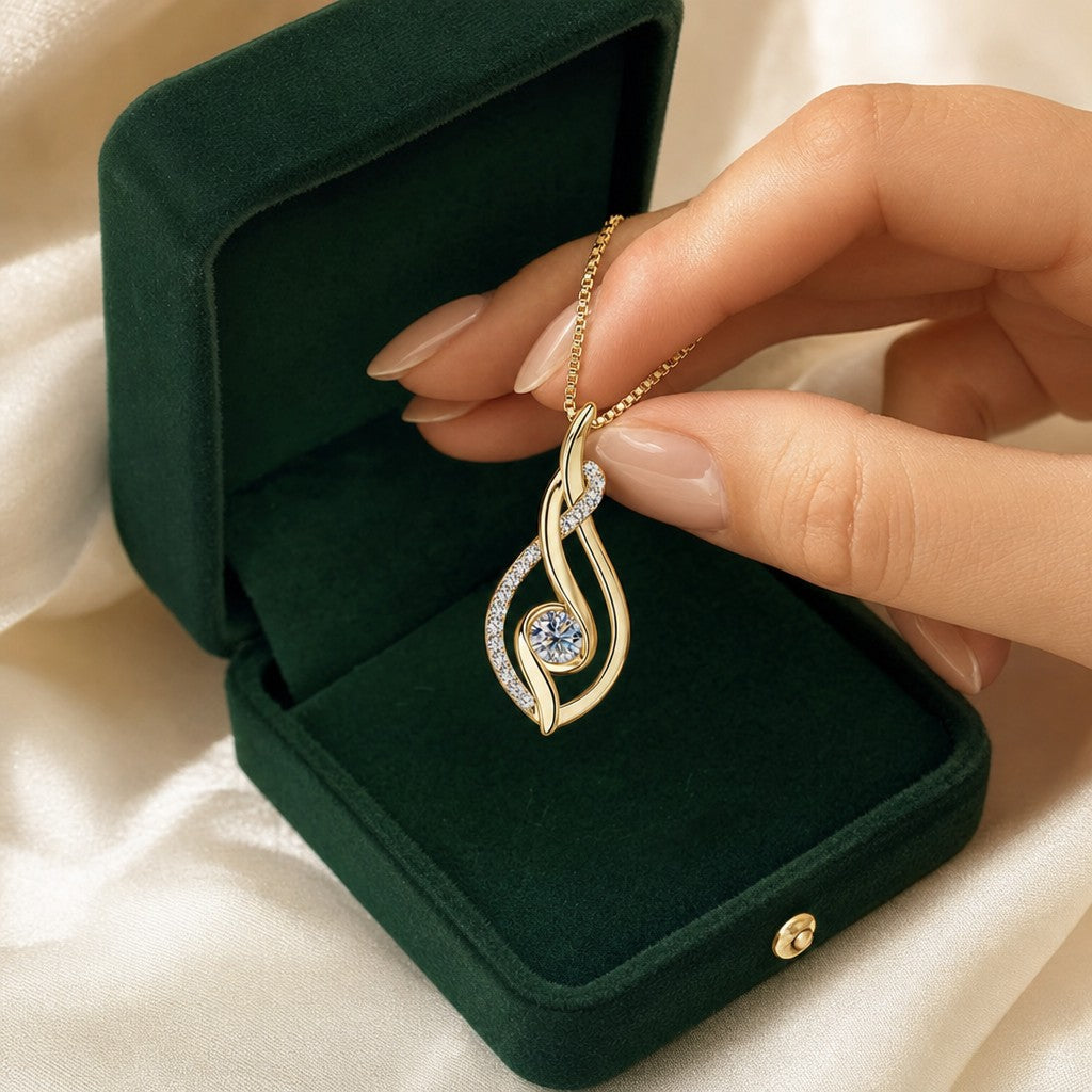 Diya Al Nur Pendant presented in an emerald velvet gift box