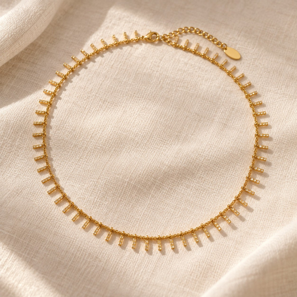Zayna Dangle Choker on cream linen