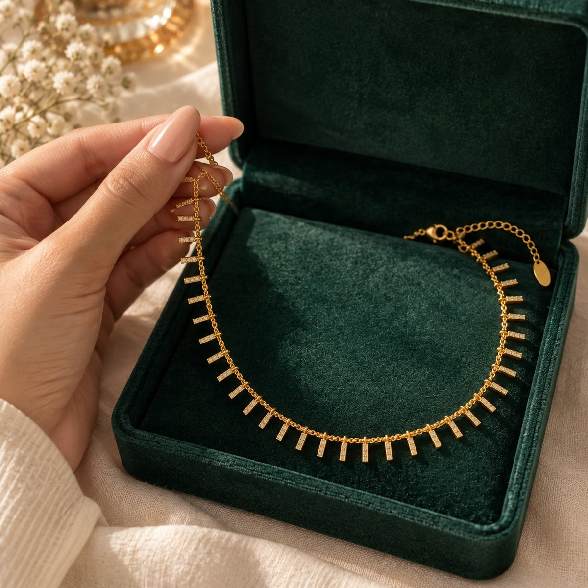 Zayna Dangle Choker presented in an emerald velvet gift box